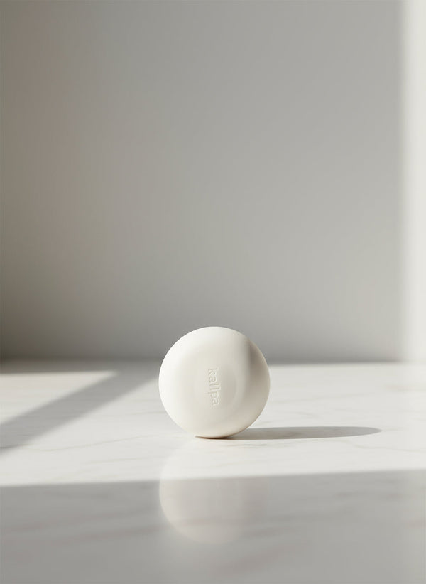 Minimalist oat latte silicone massage ball, essential physio tool for self-massage and mobility