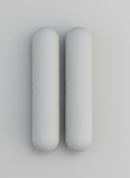 Two hand weights 2kgs in grey background with shadows