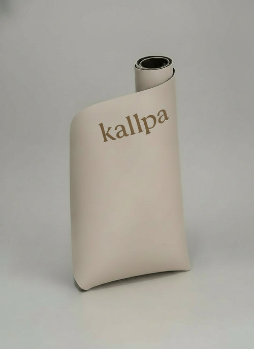 Elegant Kallpa Move oat latte aesthetic curved yoga mat (front side) with natural rubber base for cushioning and posture alignment