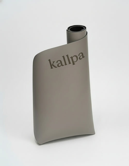 Kallpa Move Curved Yoga Mat in Andes Taupe as seen in Harper's Bazaar