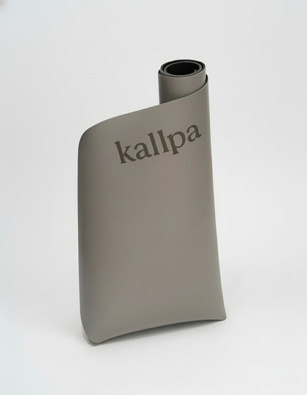 Kallpa Move Curved Yoga Mat in Andes Taupe as seen in Harper's Bazaar